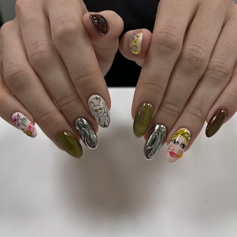 Mixed hand-painted nail art in green, silver and floral by Tina Green Nail