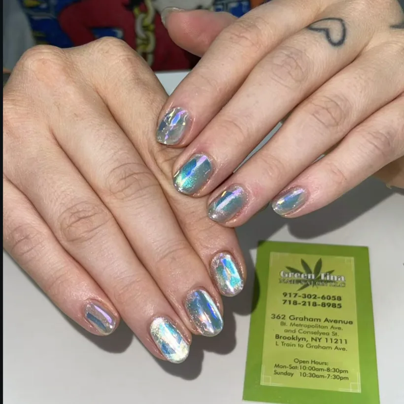 Iridescent glass chrome nails by Tina Green Nail