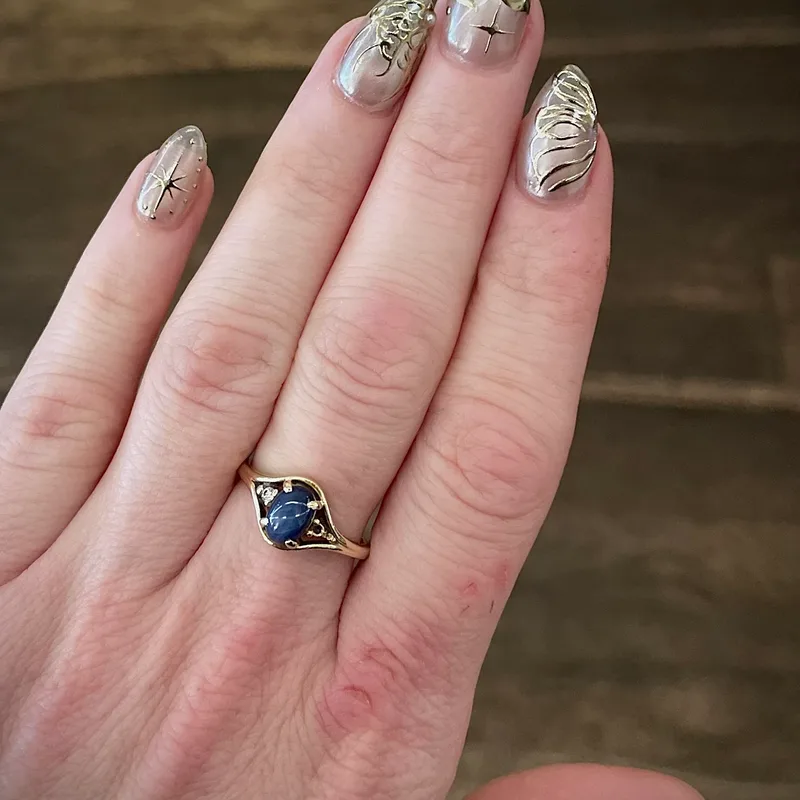 Sheer nails with gold-line butterfly and star art by Tina Green Nail